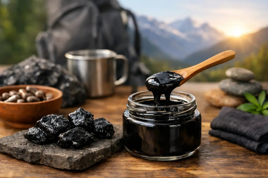 Best Shilajit Resin for Energy in a jar with wooden spoon and natural mountain background