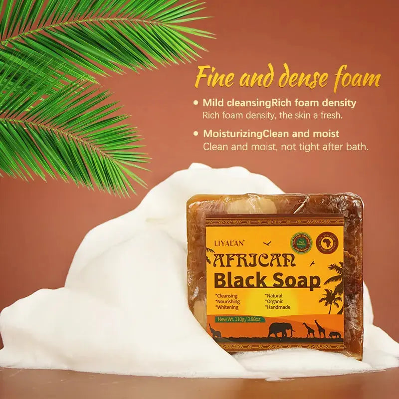 African black soap soap bar with fine dense foam and moisturizing cleansing properties on brown background