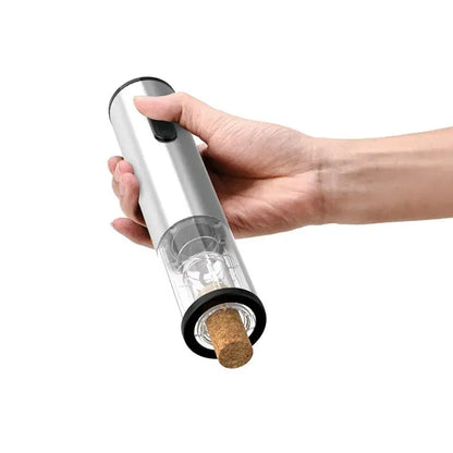 Hand holding Allebuy electric wine opener demonstrating how to open wine with a bottle opener