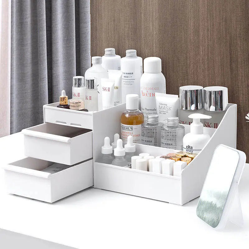 White makeup cosmetics organizer with drawers and multiple compartments holding skincare bottles and lipsticks