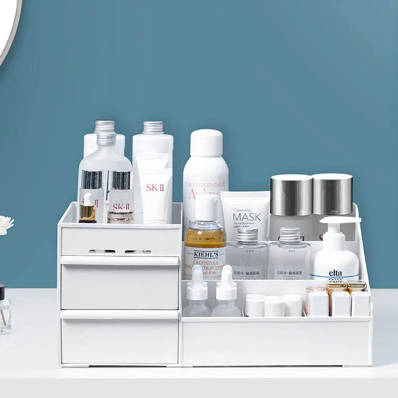 White makeup cosmetics organizer with multiple compartments holding skincare bottles and tubes